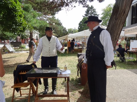 The Surgeon and the Chaplain discuss amputation.